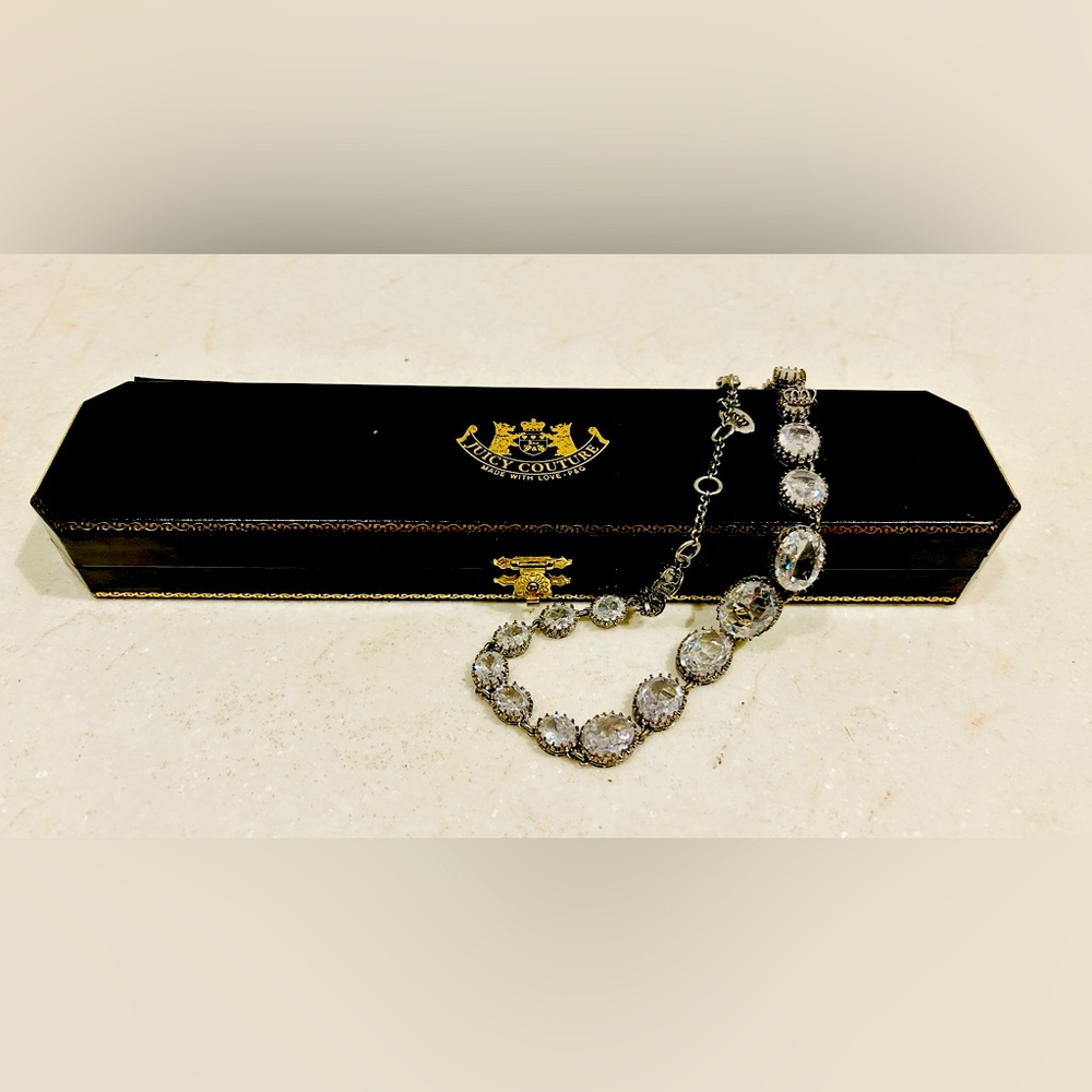 Gorgeous and glamorous vintage juicy Couture. New in box.